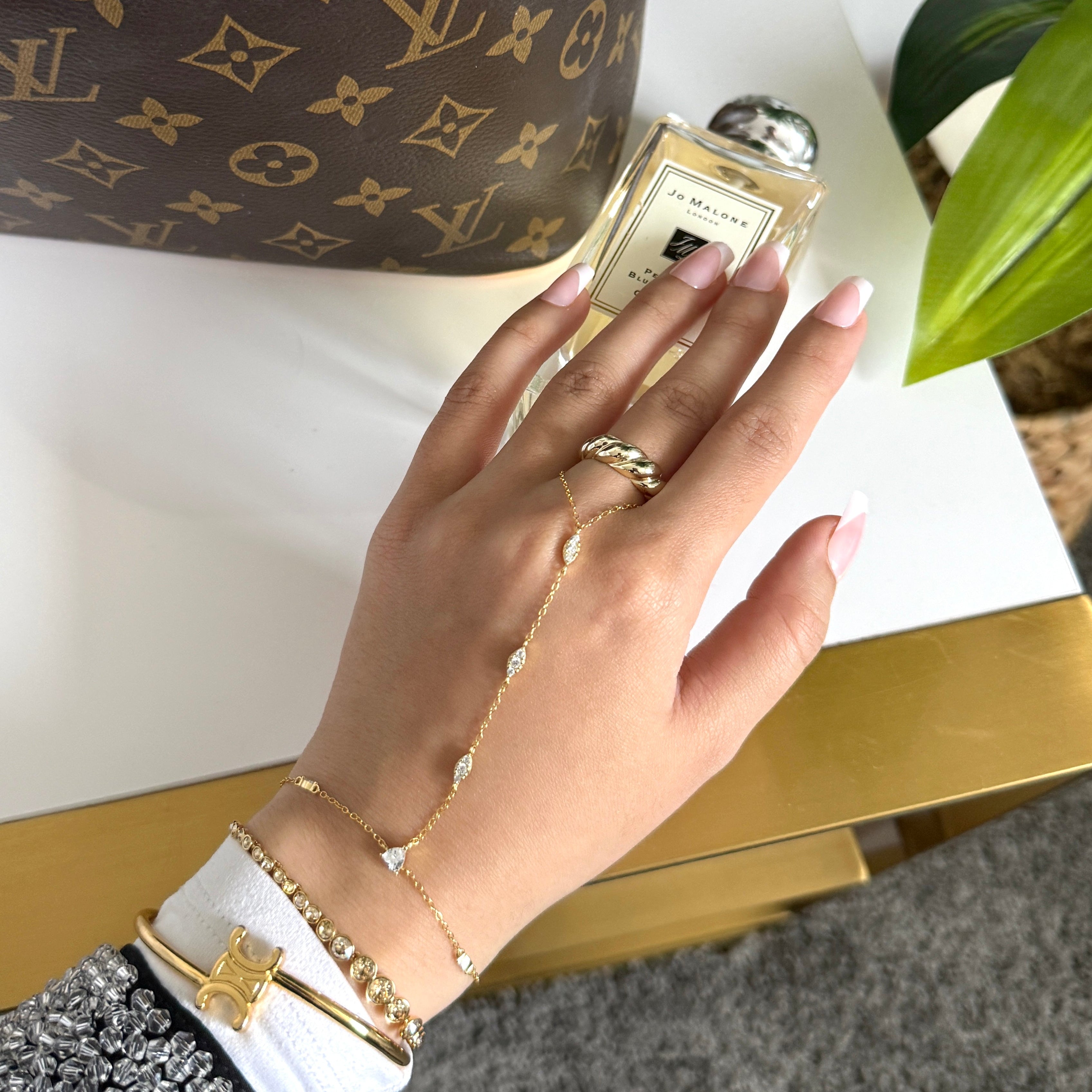 Adorné Silver Hand Chain Bracelet